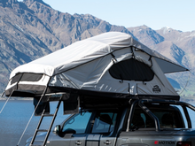 Load image into Gallery viewer, SMRT softshell rooftop tent, open grey rain fly
